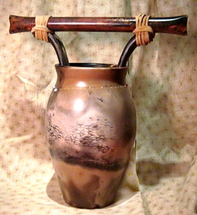 11" x 11"
$ 150.00 Naked Raku pottery by Nan Mazzuco
